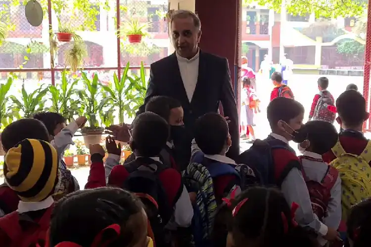 Father Sebastian interacting with students of Don Bosco School, Pan Bazar, Guawahti