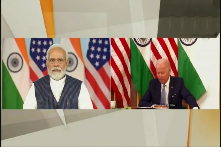 Prime Minister Narendra Modi and Joe Biden interacting in virtual mode