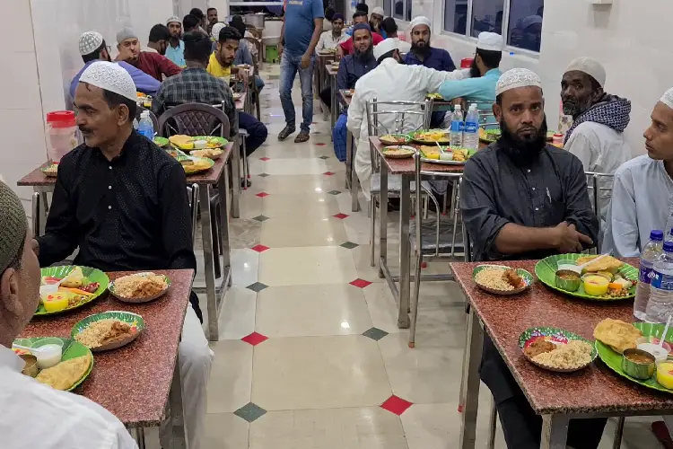 Fasting Muslims enjoying their Iftar meal in Matiur Rahman's Hotel