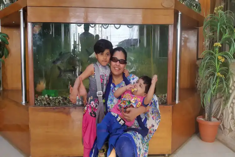 Tabassum Haq with her children