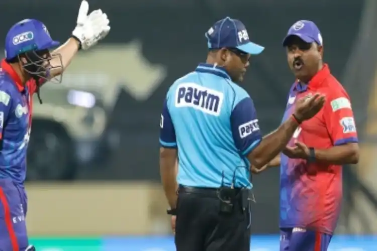 Delhi Capitals coach Pravin Amre argues with an umpire during the match against Rajasthan Royals.