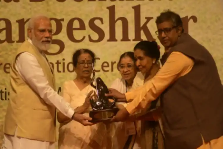 PM Narendra Modi receiving the first Lata Mangeshkar award.