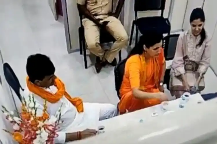 Navneet Rana and her husband Ravi Rana seen in a grab of a video at Khar police station.