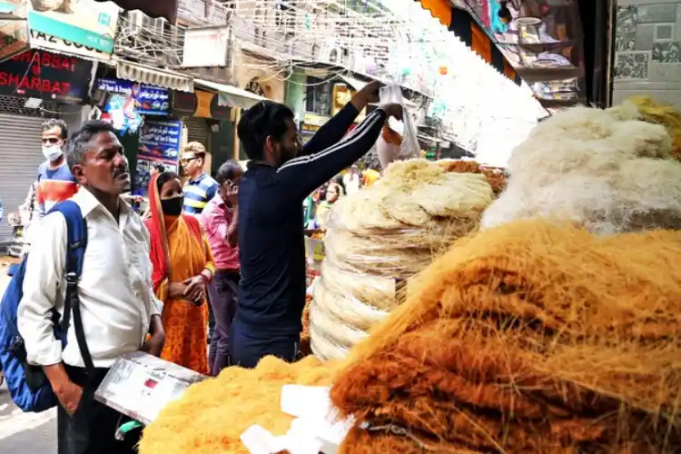 Customers outside a sevai shop in Jama Masjid market.