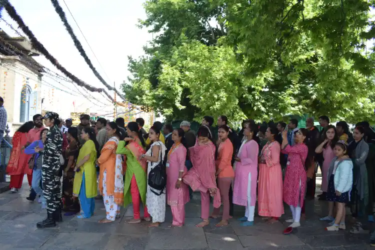 Devotees in a queue at the Shankaracharya Temple in Srinagar. (Photo: Basit Zargar)