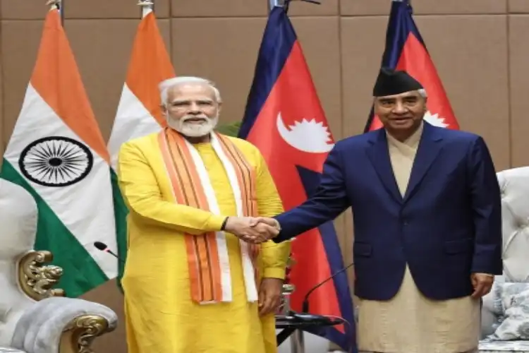 Prime Ministers Narendra Modi and Sher Bahadur Deuba at Lumbini after the two countries signed MOUs