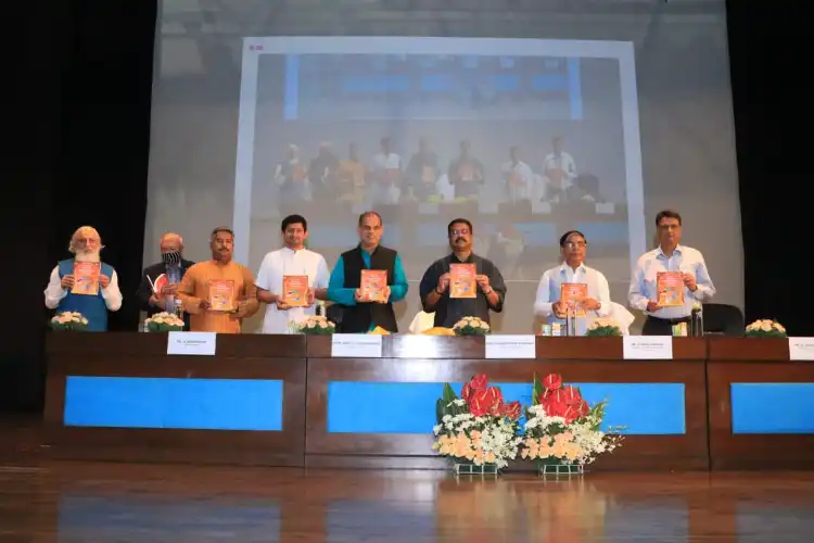 Education minister Dharmendra Pradhan inaugurating the book