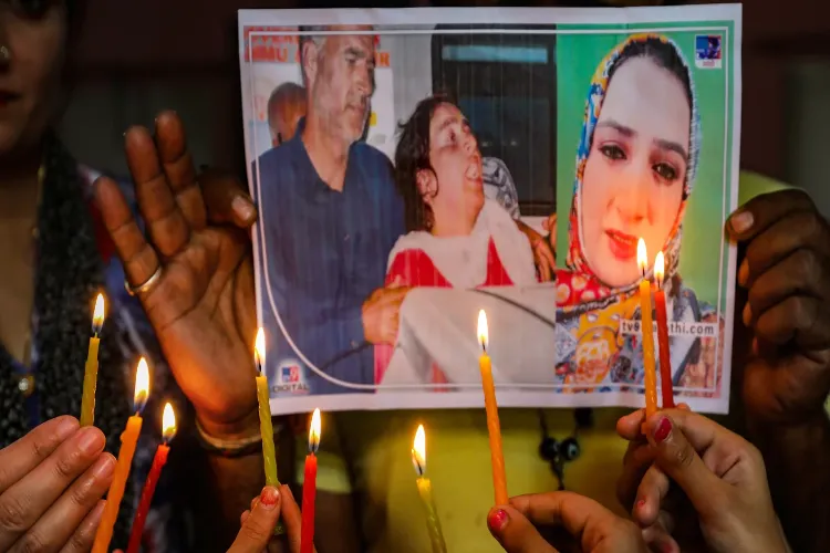 Protesters holding Ambreen's posters