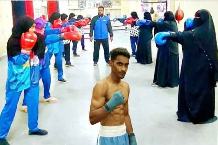 Seikh Aijaz Ahmed with his students in his Boxing arena