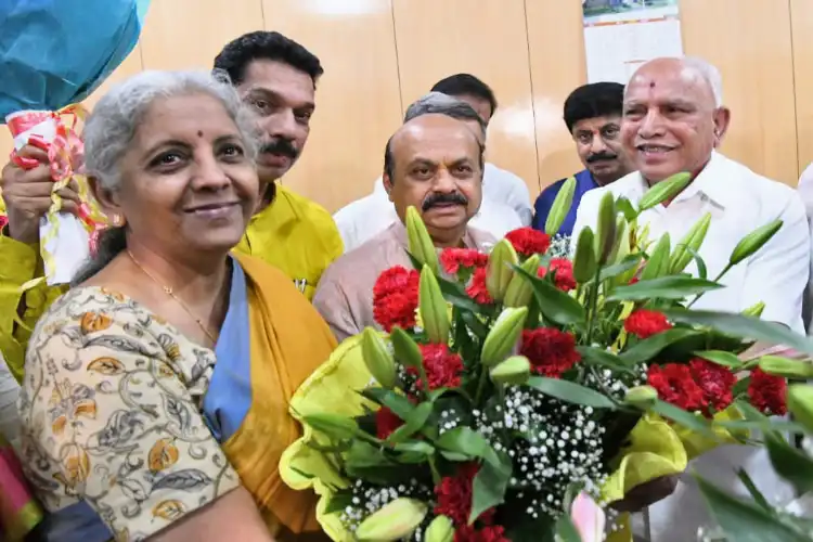 Finance Minister Nirmala Sitharaman being presented with a bouquet on her election