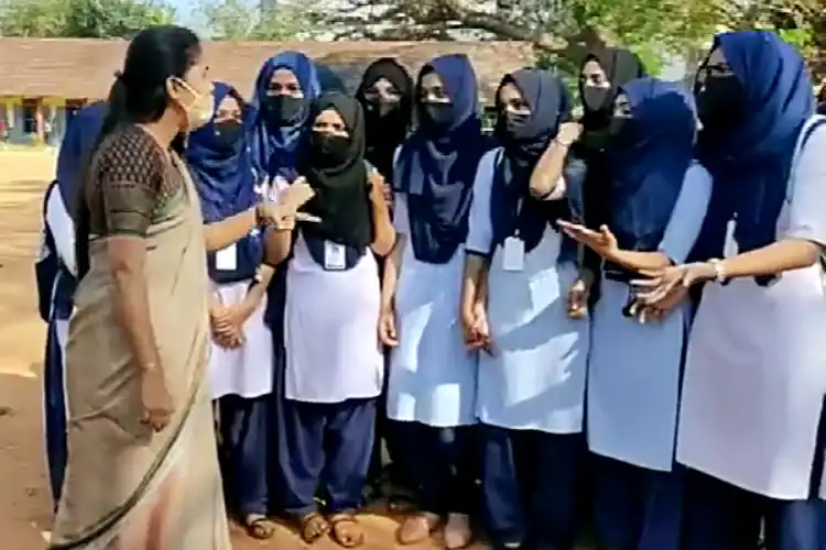 A teacher counselling girls about school uniform in Udupi college (File)