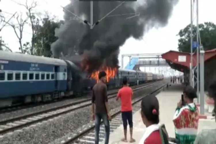 A Train set on fire by protesters in Bihar