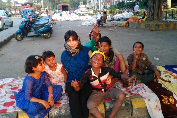 Seema Hussain with underprivileged children