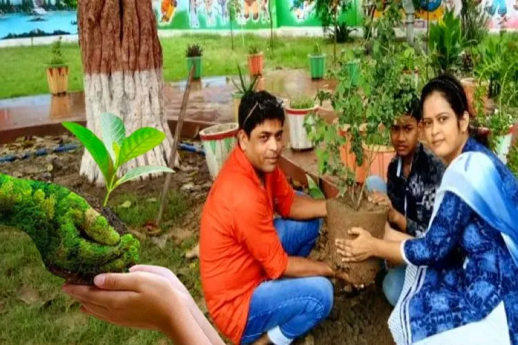 Muhammad Shahid planting a sapling in school premises