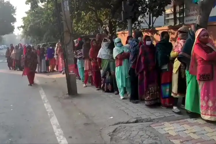 Women voters outside a booth in Panchkula, Haryana