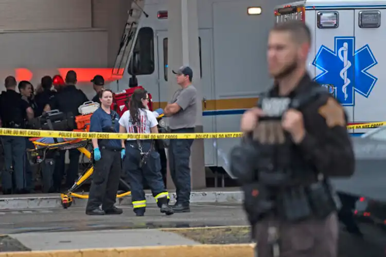 Emergency personnel at the site of the shooting