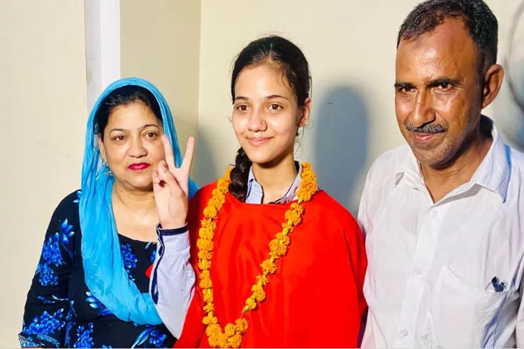 Saria Khan with her parents after the result
