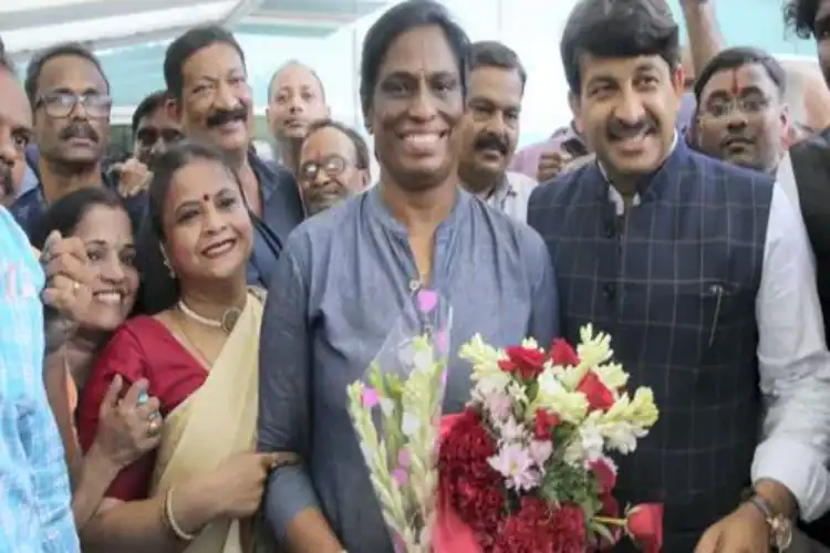 PT Usha with BJP MP Manoj Tiwari 