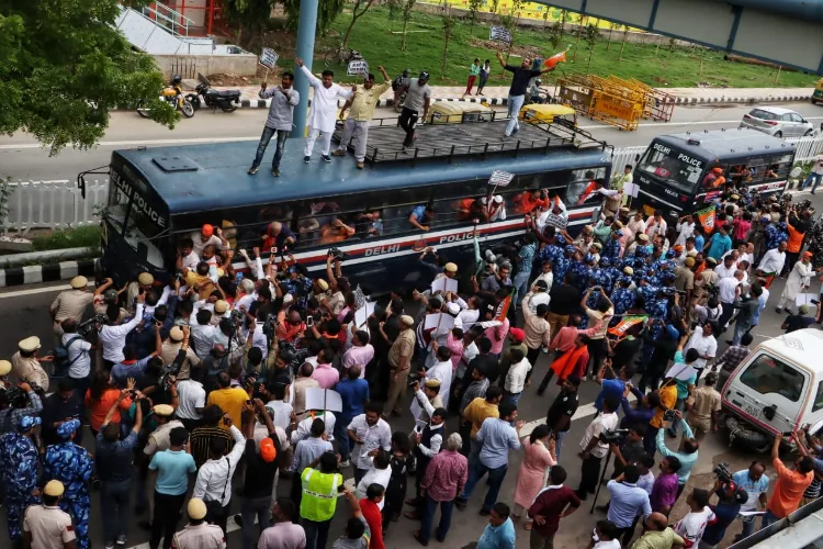 Delhi BJP workers protesting against AAP's new liquor policy