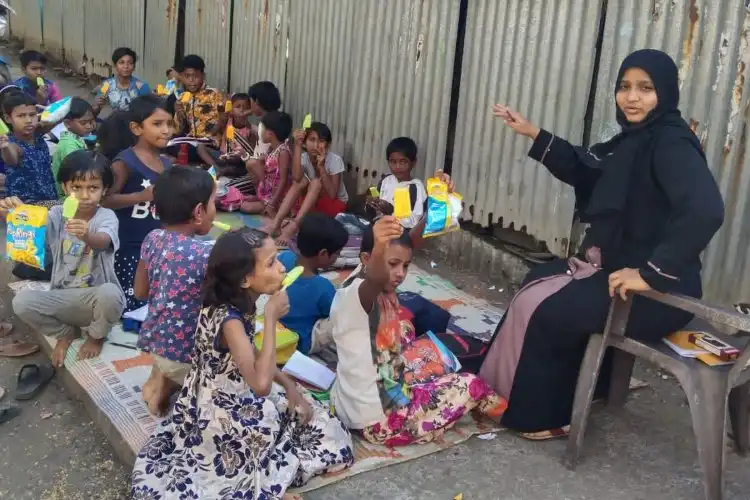 Yasmeen with her students