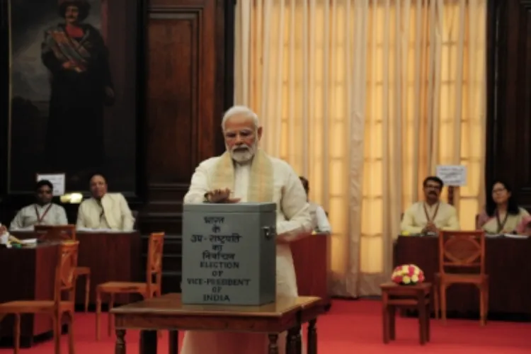 Prime Minister Narendra Modi casts his vote for vice president elections, in Parliament on Saturday