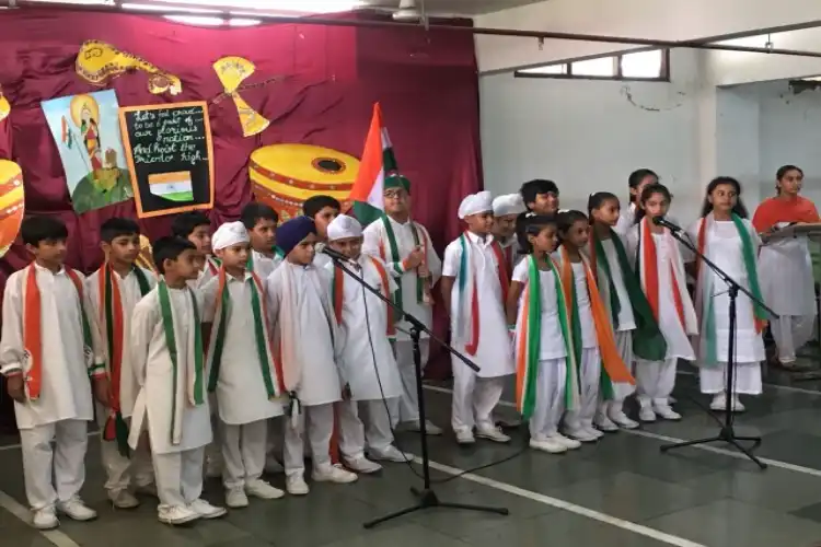 File picture of school students singing patriotic songs