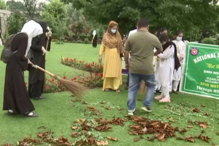 School girls participate in cleanliness drive in Srinagar's Mughal gardens