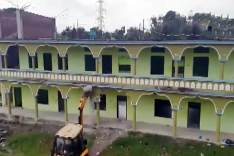 Madrassa in Kabaitari, Bongaigaon district of Assam being demolished