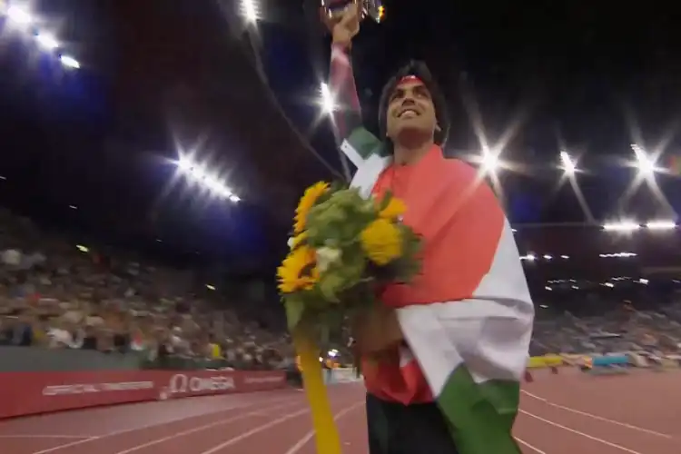 A triumphant Neeraj Chopra with his trophy and medal at the Diamond League trophy at Zurich, Switzerland (Twitter of Indian Army)