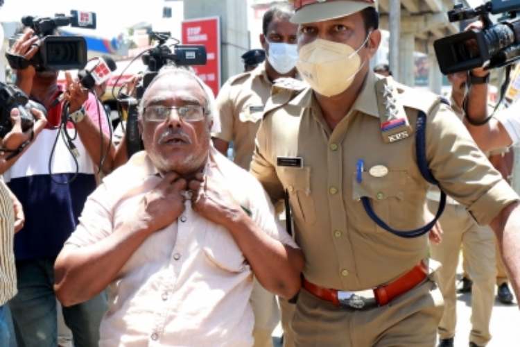 Kerala police detaining protestors during the day-long bandh called by PFI