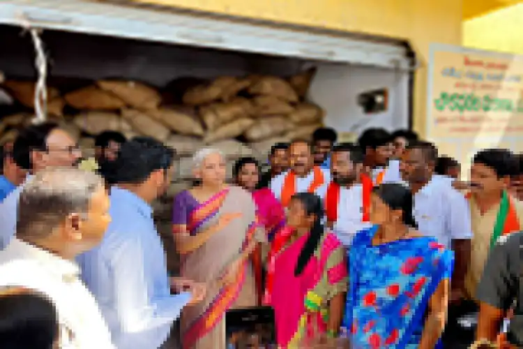 Finance Minister Nirmala Sithraman supervises ration distribution at an outlet in Telangna