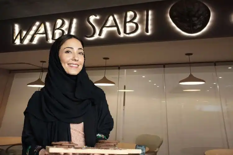 Abeerul Matlaq in front of her restaurant Wabi Sabi