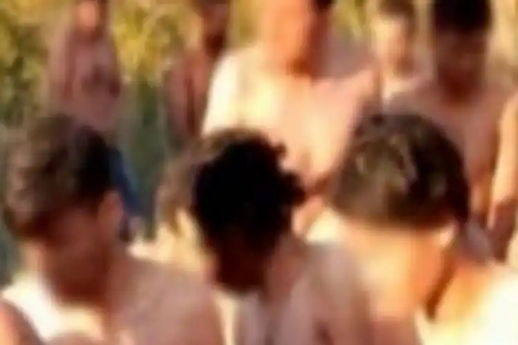 naked refugees (image deliberately blurred)