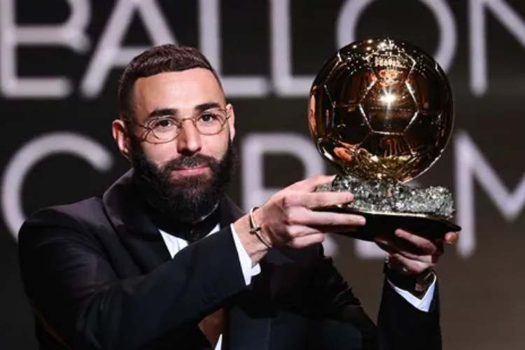 Karim Benzema with the Ballon d'Or