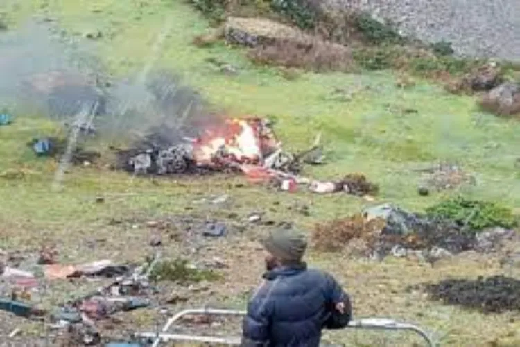 Burning Debris of the helicopter atop a hill