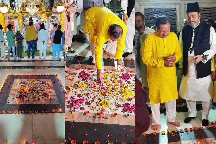 Indresh Kumar lighting diyas at Hazrat Nizamuddin dargah in Delhi