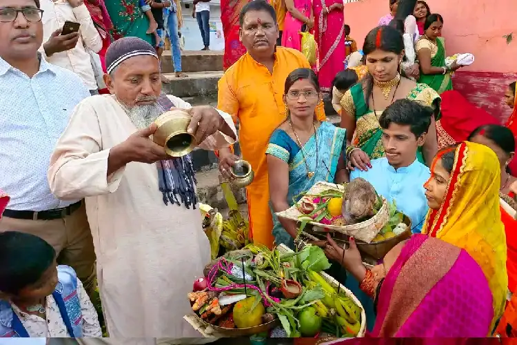 Samir Ali's family performing Chhat Puja on the banks of Bramhaputra