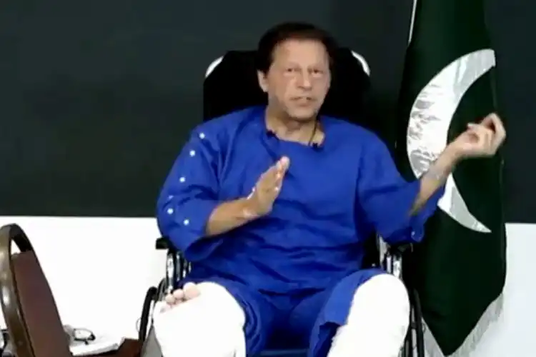 Imran Khan speaking to media person from his hospital bed