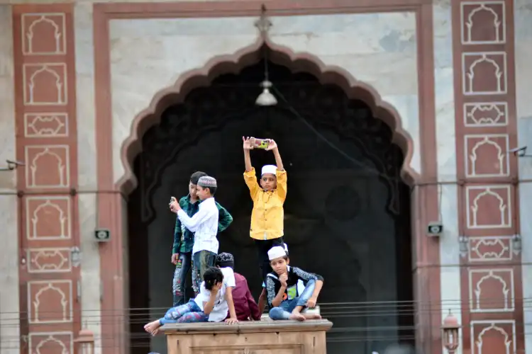 Muslim Children enjoying themselves at Jama Masjid, Delhi, (Ravi Batra)