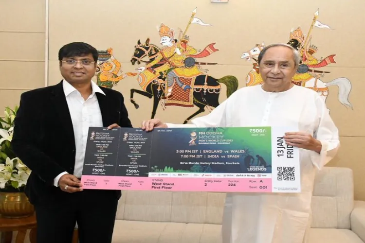 Odisha CM Naveen Patnaik receiving the first ticket of Hockey World Cup 2023 from Hockey India President Dilip Tirkey 