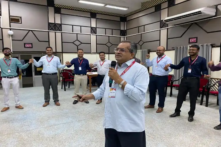 Father V N Joseph with the executives of OIL company in Assam during a class