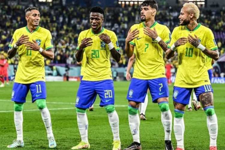 Brazilian players after scoring a goal in their 4-1 win over S Korea