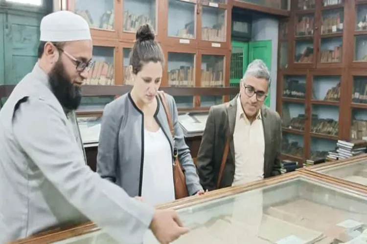 Michelle being Elms briefed about the Darul Uloom, Deoband,