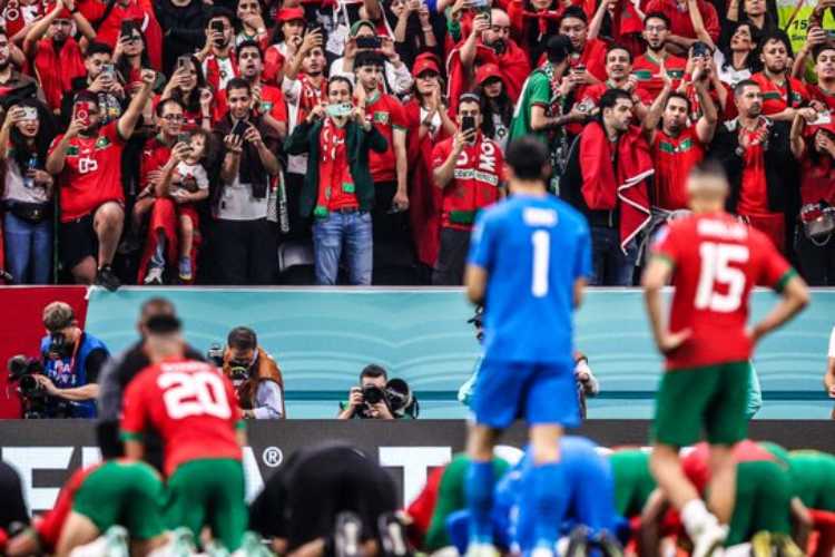 Morocco players thank their supporters after the semifinal loss on Thursday