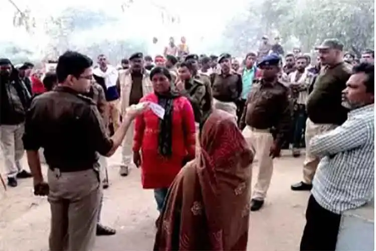ASP Syed Imran Masood counselling the siblings of Raika Khatoon 