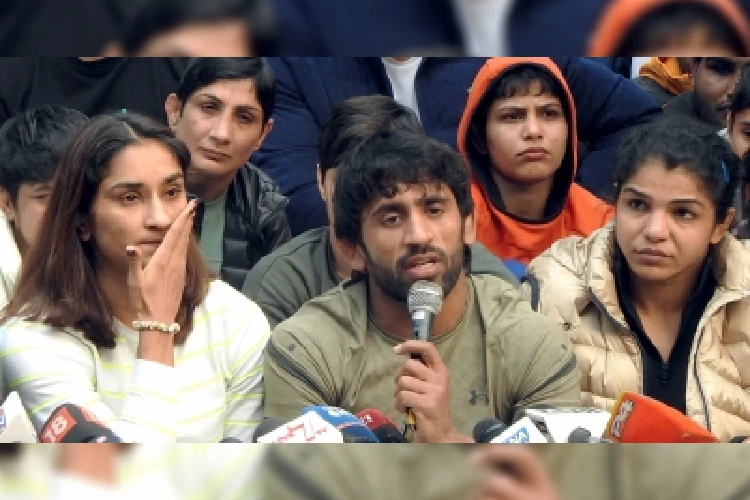 Wrestlers sitting on peaceful protest 