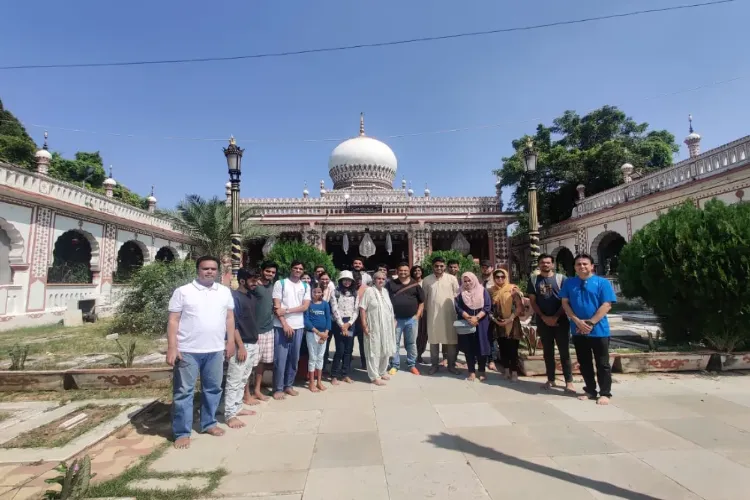 Mohammad Sibghatullah Khan (In Blue shirt standing extreme right) with locals on a curated heritage walk