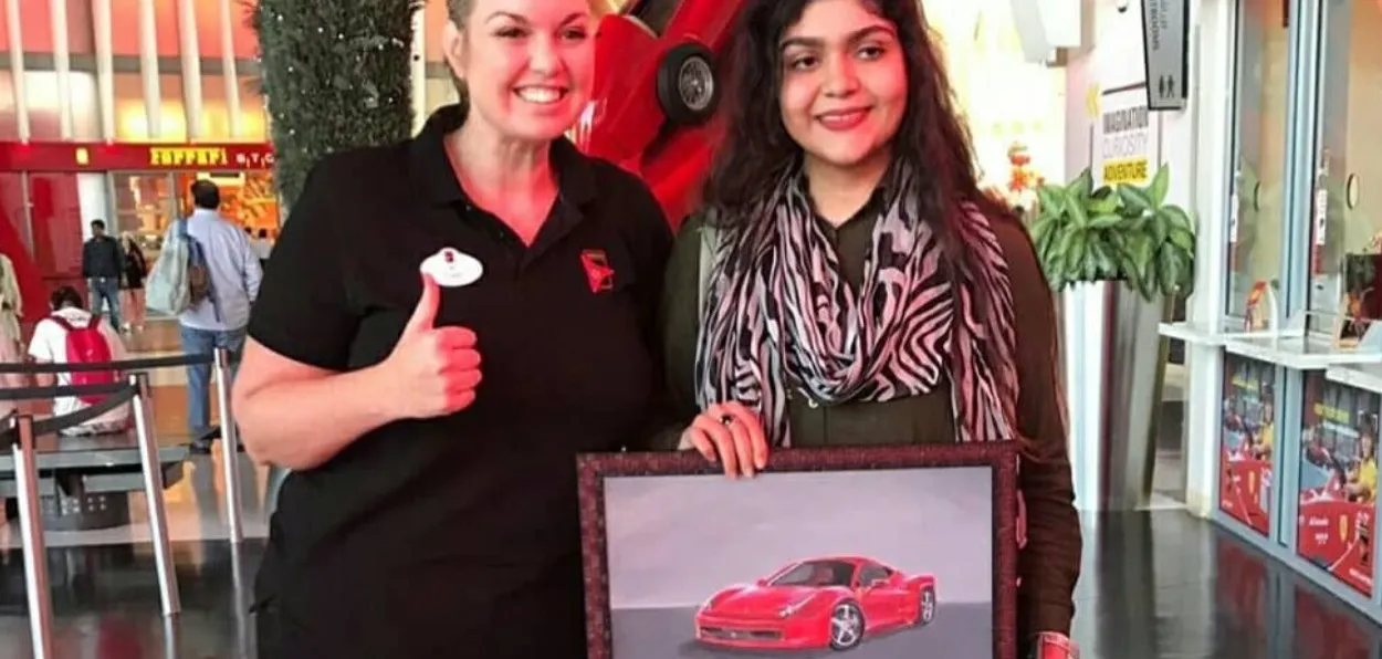 Nawab Jehan Begum gifting her painting to Ferrari company