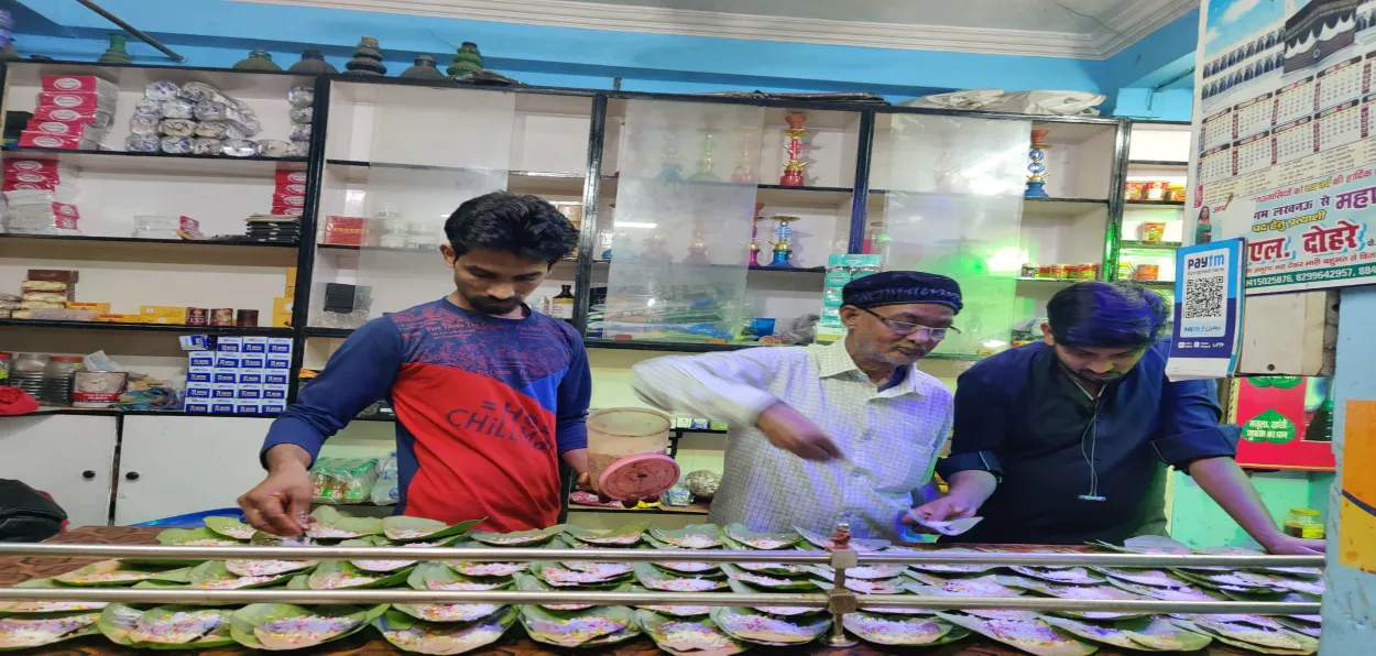 Azhar Bhai with his nephews at his shop in Lucknow
