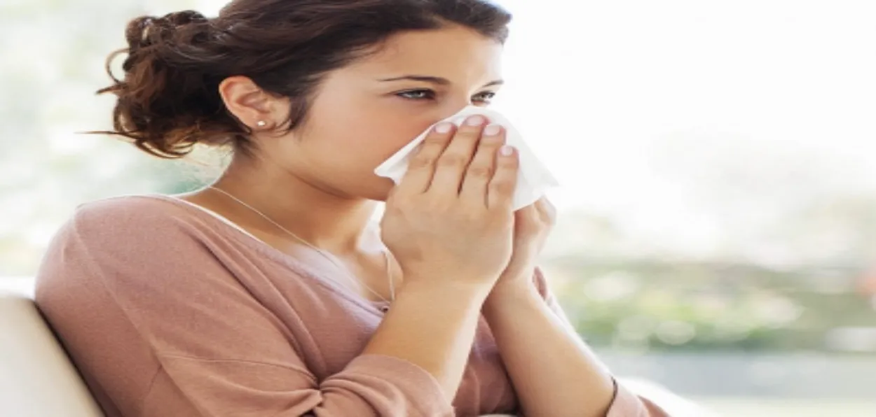 A lady suffering from cold and cough